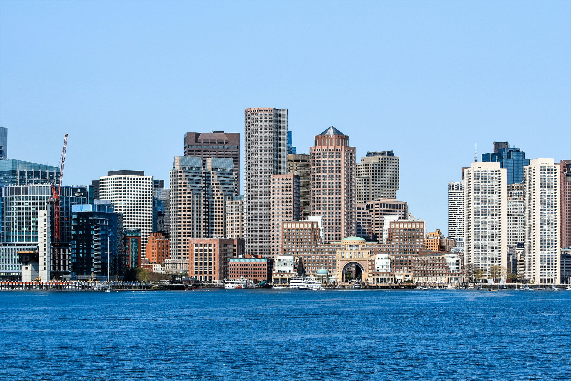 Boston skyline seen from the harbor, with Rowes Wharf and the Financial District